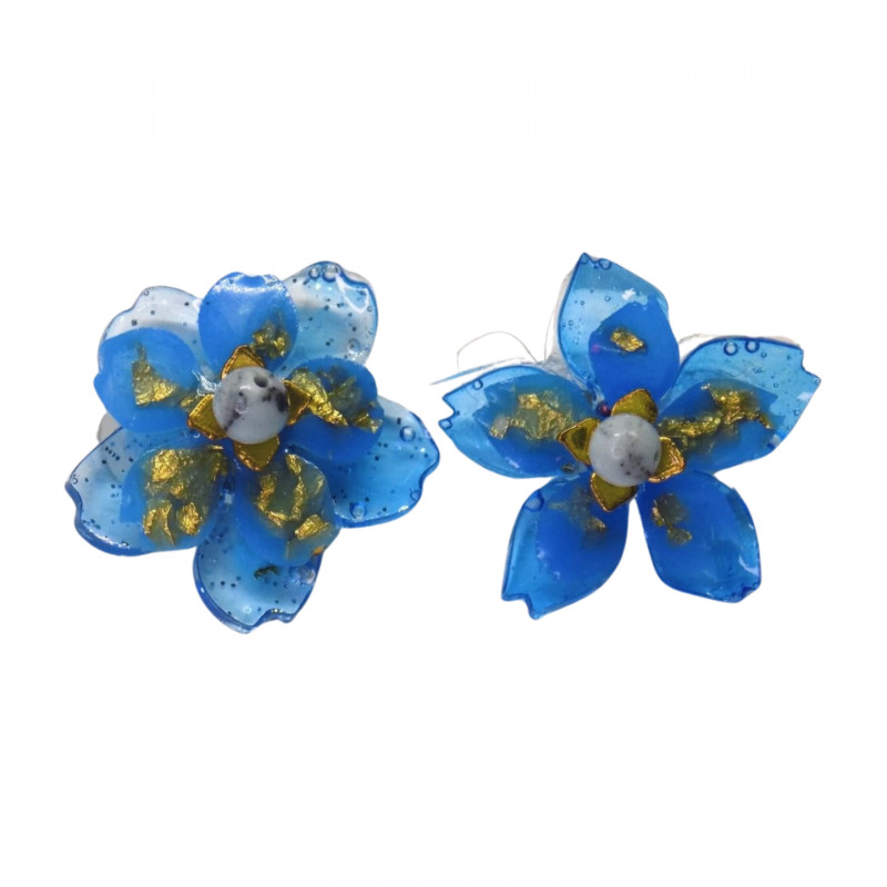 petite fleur de cerisier bleu en résine elle mesure 2cm petite fleur de cerisier bleu en résine elle mesure 2cm